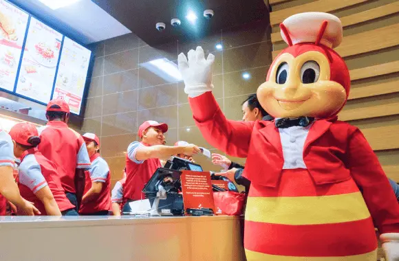 Jollibee mascot waving